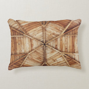 Brown wooden ceiling surface accent pillow