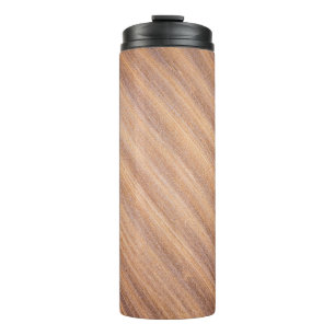 Brown wooden surface thermal tumbler