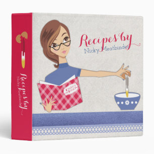Brunette woman cracking eggs recipe cookbook binder