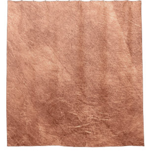 Brushed copper surface, metallic texture.