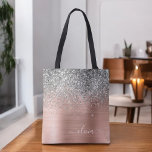 Brushed Metal Rose Gold Silver Glitter Monogram Tote Bag<br><div class="desc">Pink Rose Gold and Blush Pink and Silver Faux Sparkle and Dripping Glitter Metallic Stainless Steel Foil Elegant Monogram Book Bag. This Book Bag can be customized to include your initial and first name and given as a gift for Christmas,  Sweet 16 Birthday,  Bridal Shower or a Wedding.</div>