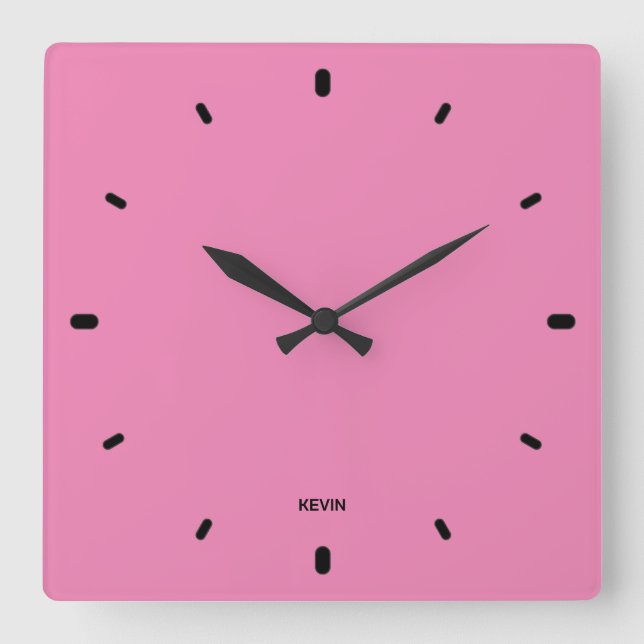 Bubble gum pink clock face and black hours numbers (Front)