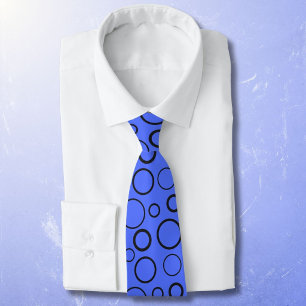 Bubbles and rings, black circles on blue tie