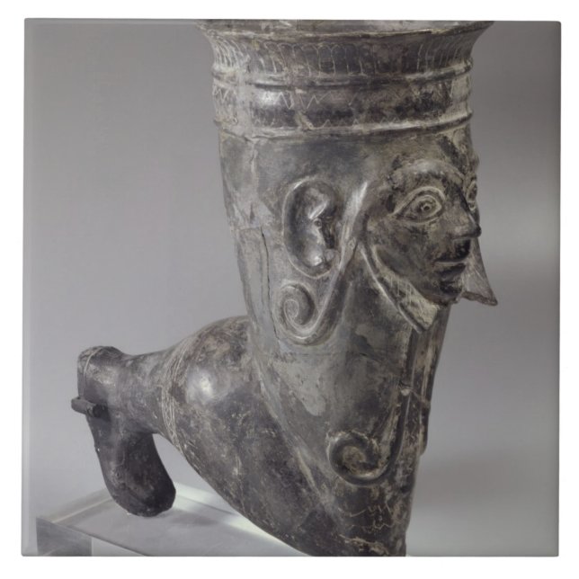Bucchero vessel in the form of a leg with sculpted tile (Front)