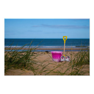Bucket and spade on beach Photo print