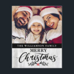 Budget Christmas Wood Family Photo Christmas Card<br><div class="desc">Budget Christmas Wood Family Photo Christmas Card -What a lovely way to send out your holiday greetings this holiday season. Your favourite photo is featured on this very special Christmas card and the budget card is personalized with your family name and Merry Christmas in pretty, modern script typography and is...</div>