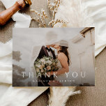 Budget Simple Elegant Modern Wedding Photo Thank You Card<br><div class="desc">This budget flat wedding thank you card features your full wedding photo,  with elegant type overlay. Customize your special wedding thank you on the back,  or remove it to leave the back blank for your handwritten message of thanks.</div>