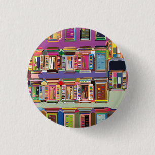 Building facade with  Multicolore windows 1 Inch Round Button