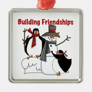 Building Friendships Holidays Snowman Penguins Metal Ornament