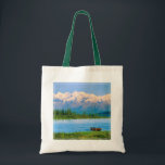 Bull moose in Wonder Lake Tote Bag<br><div class="desc">Wonder Lake,  Bull moose feeds on vegetation,  Alaska mountains in the distance,  Denali National Park,  Alaska</div>