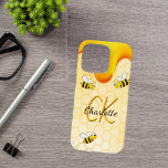 Bumble bees honeycomb honey dripping monogram iPhone 16 pro case<br><div class="desc">Yellow,  white background with a bee honeycomb pattern and happy smiling bumble bees. Decorated with sweet,  golden honey dripping. Personalize and add your name and monogram initials,  golden and black letters.  The name is written with a hand lettered style script.</div>