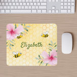 Bumble bees yellow honeycomb pink florals name mouse pad<br><div class="desc">Yellow,  white background with a honeycomb pattern. Decorated with pink tropical florals flowers,  hibiscus and happy bumble bees. Your name written with a green hand lettered style script. Perfect for your summer home work space,  office!</div>