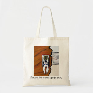 Bunnies like to read upside down. tote bag