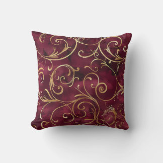 Burgundy and gold filigree print throw pillow
