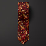 Burgundy and Gold Monogram Tie<br><div class="desc">Make a regal statement with our Burgundy and Gold Monogram Neck Tie. The rich burgundy and gold combination exudes luxury and style. Don't miss the opportunity to pair it with our matching socks for a complete ensemble.</div>