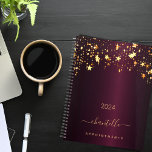 Burgundy gold stars name script glamourous 2025 planner<br><div class="desc">A dark burgundy background, decorated with faux gold dripping stars. Template for a year. Personalize and add a name and a title. The name is written with a golden modern hand lettered style script with swashes. Perfect for school, work or organizing your personal/family life. To keep the swashes only delete...</div>