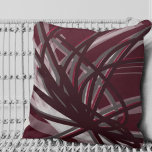 Burgundy & Grey Artistic Abstract Ribbon Design Throw Pillow<br><div class="desc">Burgundy and grey throw pillow features an artistic abstract ribbon composition with shades of grey and burgundy with white accents on a rich burgundy background. This abstract composition is built on combinations of repeated ribbons, which are overlapped and interlaced to form an intricate and complex abstract pattern. The shades of...</div>