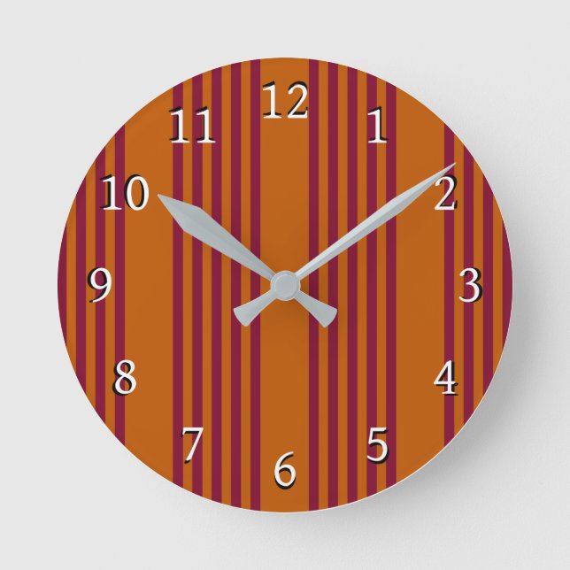 Burgundy red and burnt orange five stripe pattern. round clock (Front)