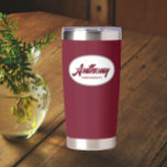 Burgundy Stylized Wedding Groomsman Name Insulated Tumbler<br><div class="desc">Gift your wedding groomsman this trendy and personalized,  stainless steel,  thermal tumbler with his name in stylized script in a white oval design. Background and script is a burgundy colour. Personalize your thermal tumbler by editing and replacing groomsman's name with desired name.</div>