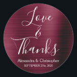 Burgundy Wedding Love & Thanks Classic Round Sticker<br><div class="desc">Burgundy Purple - Cranberry Marsala and White Typography Script Faux Faux Metal Metallic Elegant Love and Thanks - Thank You Favour Sticker that can be used as an Envelope Seal. This sticker can be customized to include your name and wedding date. This sticker is part of a matching autumn or...</div>
