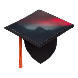 Burning clouds, fog and mountains graduation cap topper