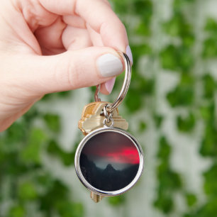 Burning clouds, fog and mountains keychain