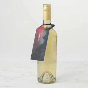 Burning clouds, fog and mountains monogram in sky bottle tag
