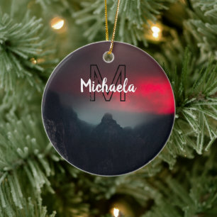 Burning clouds, fog and mountains monogram in sky ceramic ornament