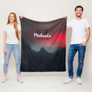 Burning clouds, fog and mountains monogram in sky fleece blanket