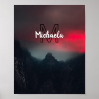 Burning clouds, fog and mountains monogram in sky