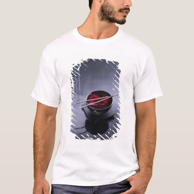 Burning incense on top of bowl of petals (Front)