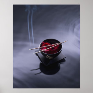 Burning incense on top of bowl of petals poster