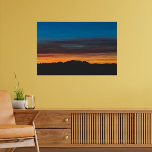 Burning sunset above landscape silhouette poster