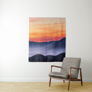 Burning sunset and fog in valley tapestry