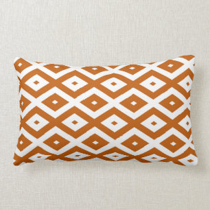 Burnt orange and white diamond pattern lumbar pillow