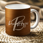 Burnt Orange Brushed Metal Script Monogram  Coffee Mug<br><div class="desc">This elegant personalized coffee mug features a monogram and first name in modern beige and white script on a trendy burnt orange brushed metal background.</div>
