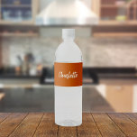 Burnt orange name script water bottle label<br><div class="desc">A trendy burnt orange coloured background. Personalize and add your name written with a modern hand lettered style script in white.</div>