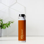Burnt orange yellow custom name script water bottle<br><div class="desc">Burnt orange as background.  Personalize and add your name.   Yellow coloured handwritten style script.</div>