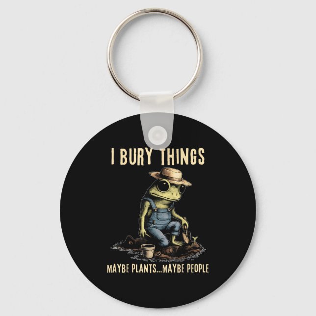Bury things maybe plants maybe people funny frog keychain (Front)