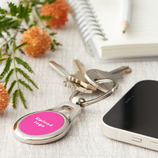 Business Logo With Pink Background on Oval Metal Keychain (Side)