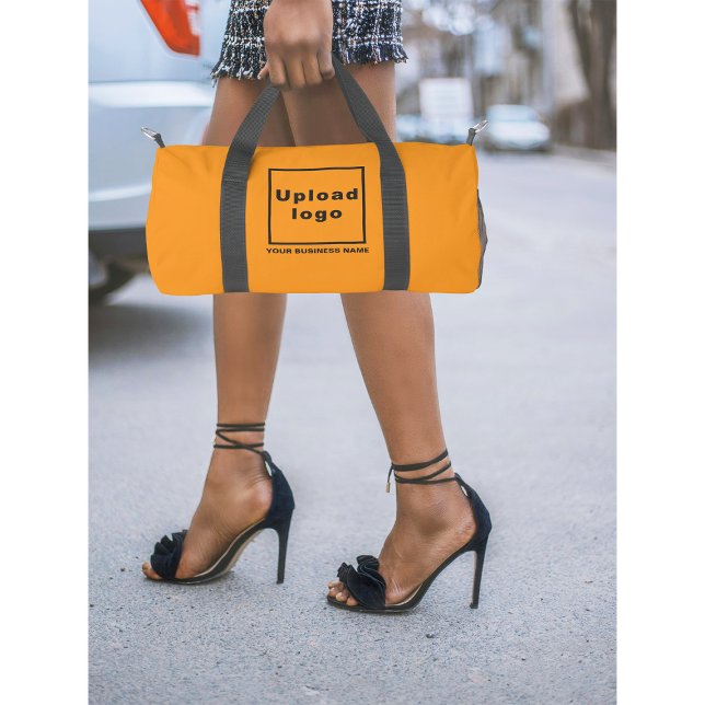 Business Name and Logo on Small Orange Colour Duffle Bag (Business name and logo on orange color duffel bag)