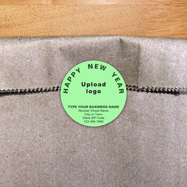 Business New Year Light Green Round Sticker (New Year greeting with your business brand on light green round shape sticker.)
