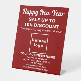 Business New Year Sale on Red Pedestal Sign