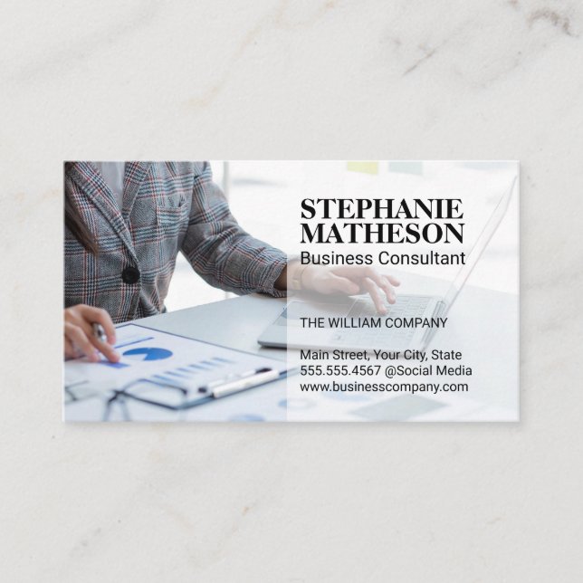 Business Person Analyzing Graphs on Finance Card (Front)