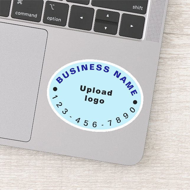 Business Phone Number on Light Blue Oval Vinyl (Detail)