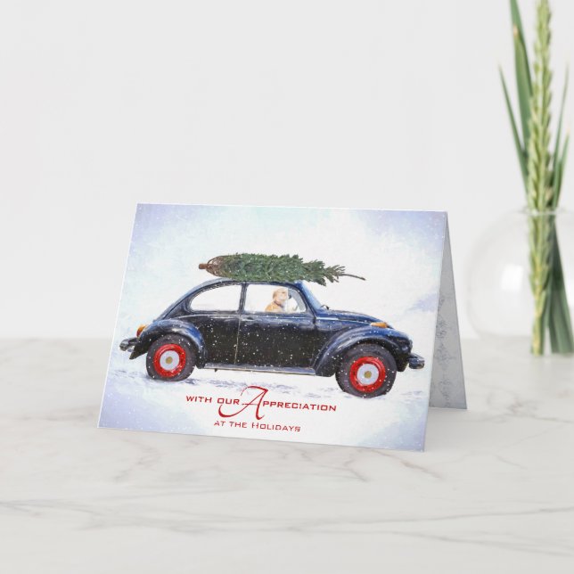 business retriever in old car with holiday tree (Front)