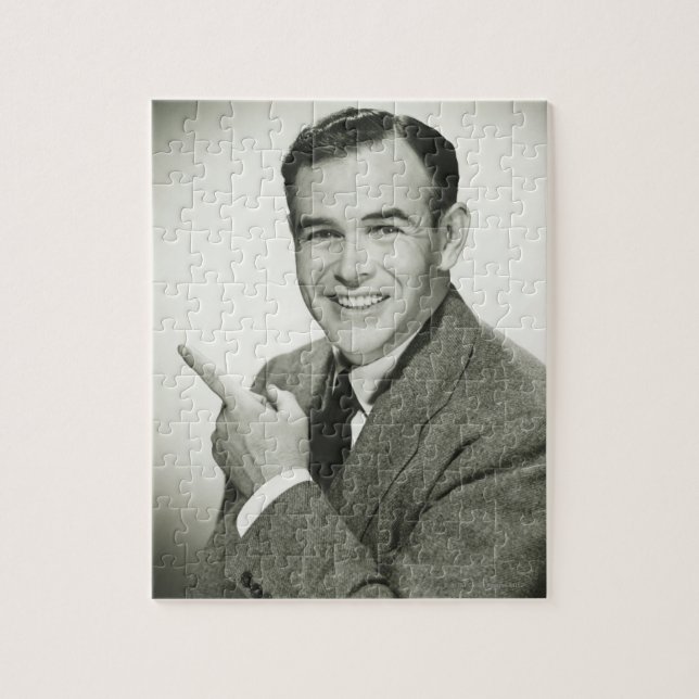 Businessman Pointing Jigsaw Puzzle (Vertical)
