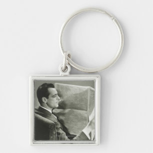 Businessman Reading the Newspaper Keychain
