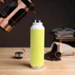 Butter Yellow Water Bottle<br><div class="desc">Known for its warm tone,  buttery shades of yellow add instant cheer and a sense of comfort to any space,  while easily complementing other hues. An inviting neutral that sits between pale yellow and creamy off-white,  it can be used in both traditional and modern designs.</div>