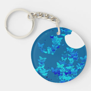 Butterflies against blue night sky, moonscape keychain